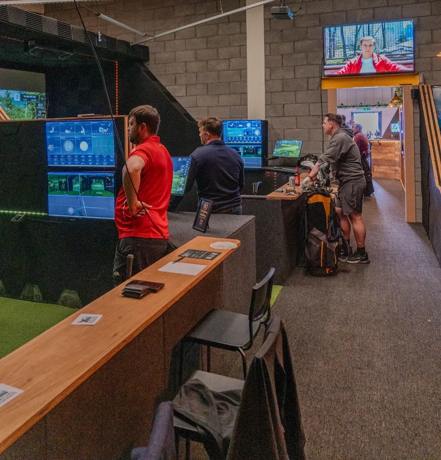 Players at the simulator bays at Virtual Fairways, Darlington